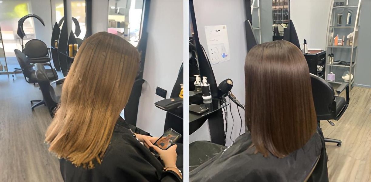 A Woman Is Getting Her Hair Cut In A Salon — Klic's Hair Design In Earlville, QLD