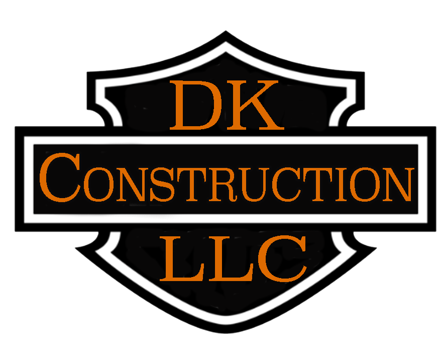 DK Construction LLC logo: Black and white shield with orange text.