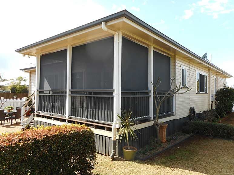 House With Screened Porch, Light Yellow Siding, Black Screens — Toowoomba Shade & Canvas in Harristown, QLD