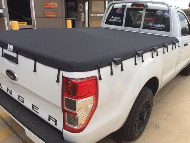White Ford Ranger Pickup Truck With a Black Bed Cover — Toowoomba Shade & Canvas in Highfields, QLD