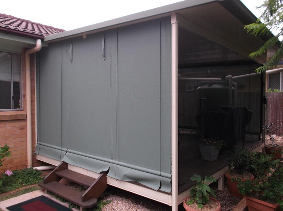 Covered Outdoor Patio With Green Shades, Wooden Steps — Toowoomba Shade & Canvas in Harristown, QLD