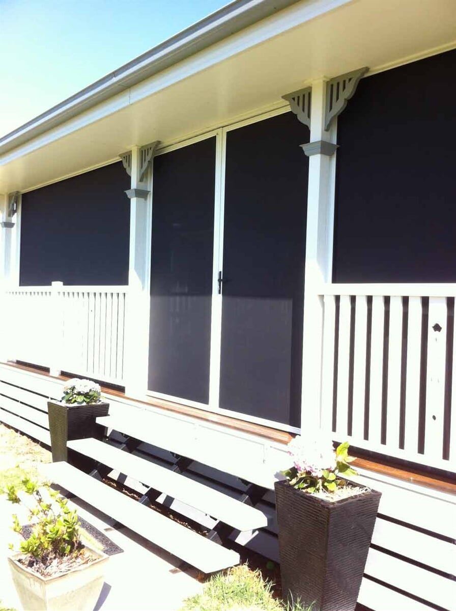 Exterior View of a House With Black Roller Blinds Installed — Toowoomba Shade & Canvas in Harristown, QLD