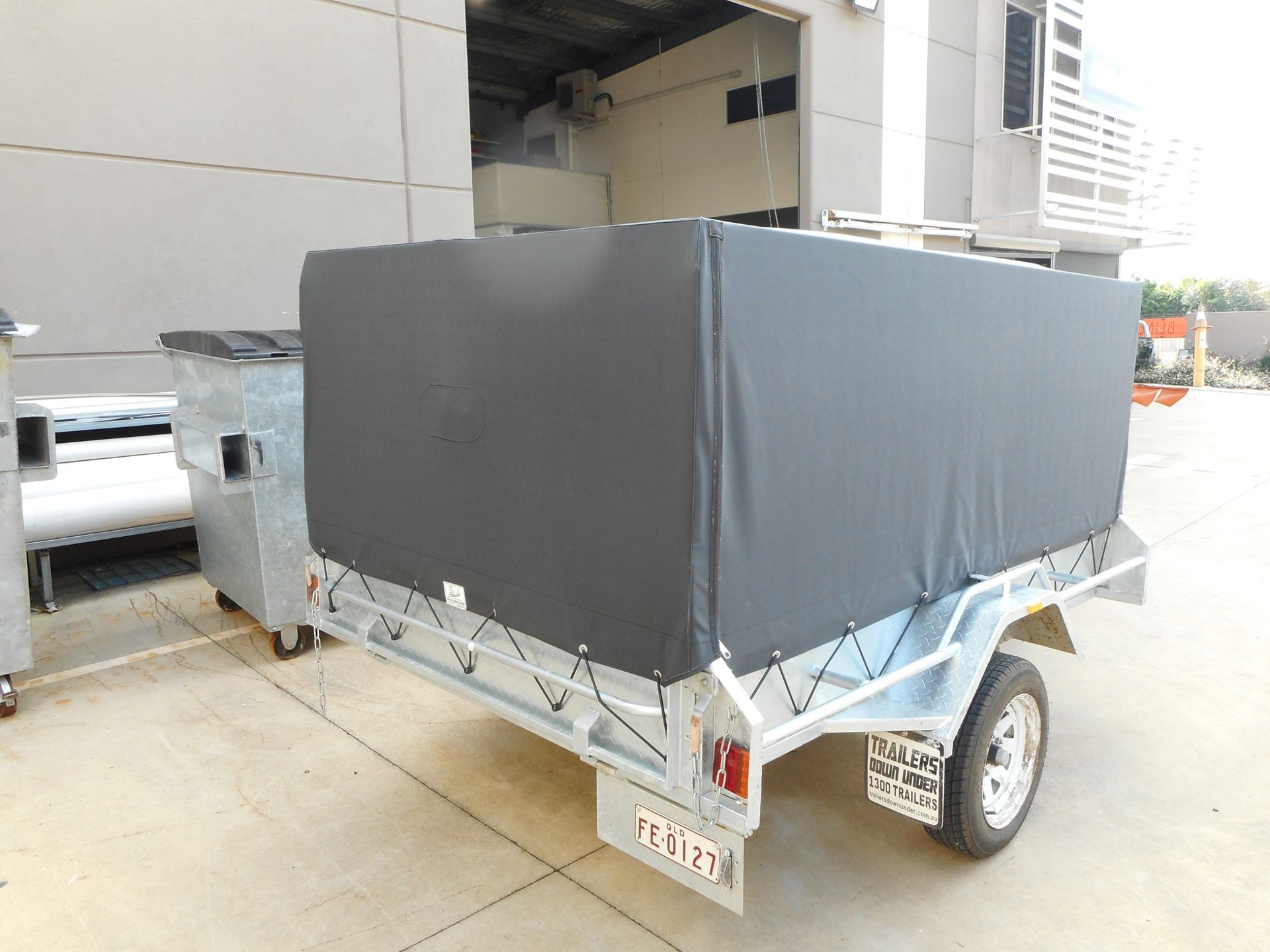 Grey Covered Trailer in an Industrial Setting — Toowoomba Shade & Canvas in Harristown, QLD
