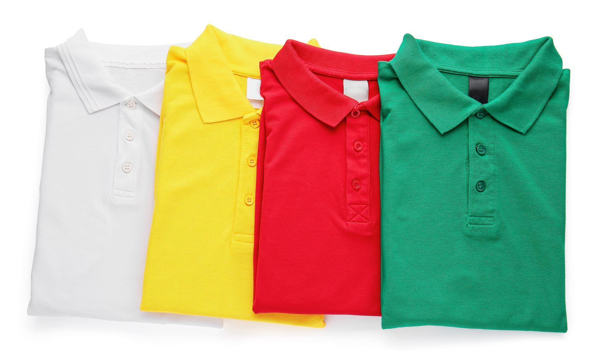 Shirts hanging on a wooden rack, various colors visible including white, black, and blue.