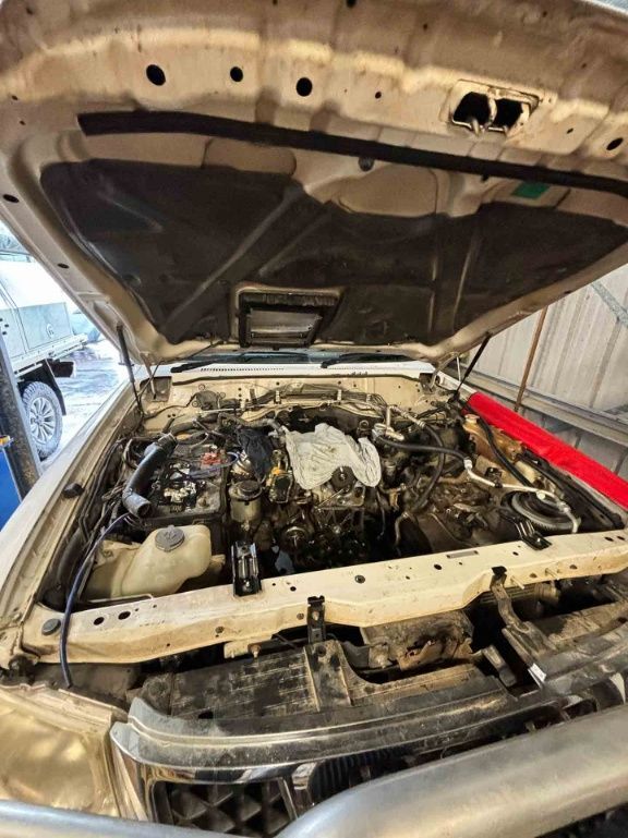 The Hood Of A Car Is Open And The Engine Is Visible — Master Mechanix In Yandina Creek, QLD