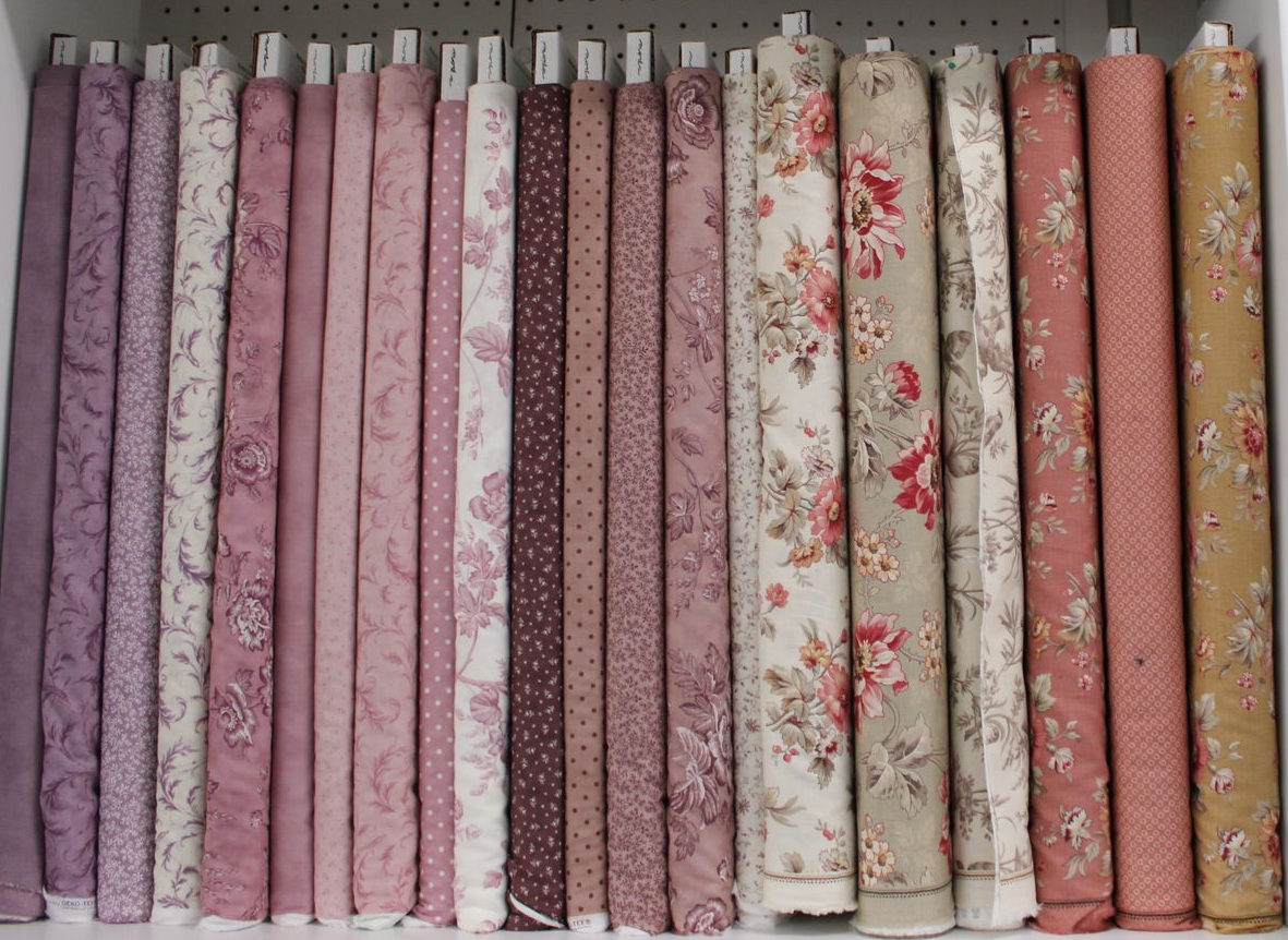 Stacks of bedding quilt fabric.
