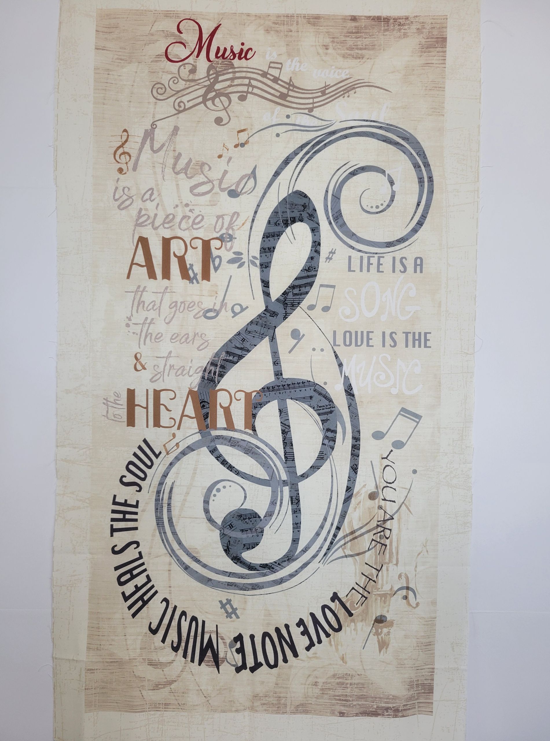 Decorative music-themed poster with a large treble clef, faded notes, and words like “Art” and “Heart.”