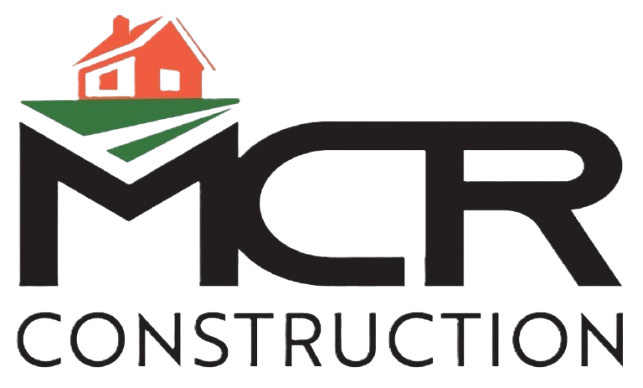 MCR Construction logo with black text and an orange house icon over a green roofline