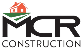 MCR Construction logo with black text and an orange house icon over a green roofline