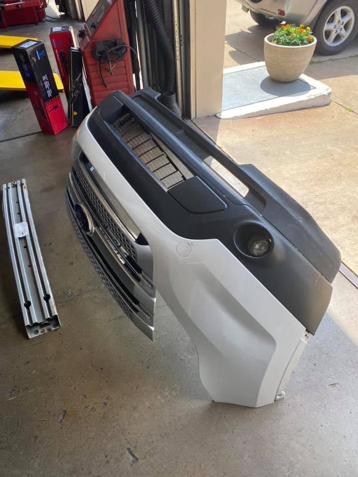 Removed Vehicle Front Bumper And Grille During Repair | 4th Street Auto Care Center