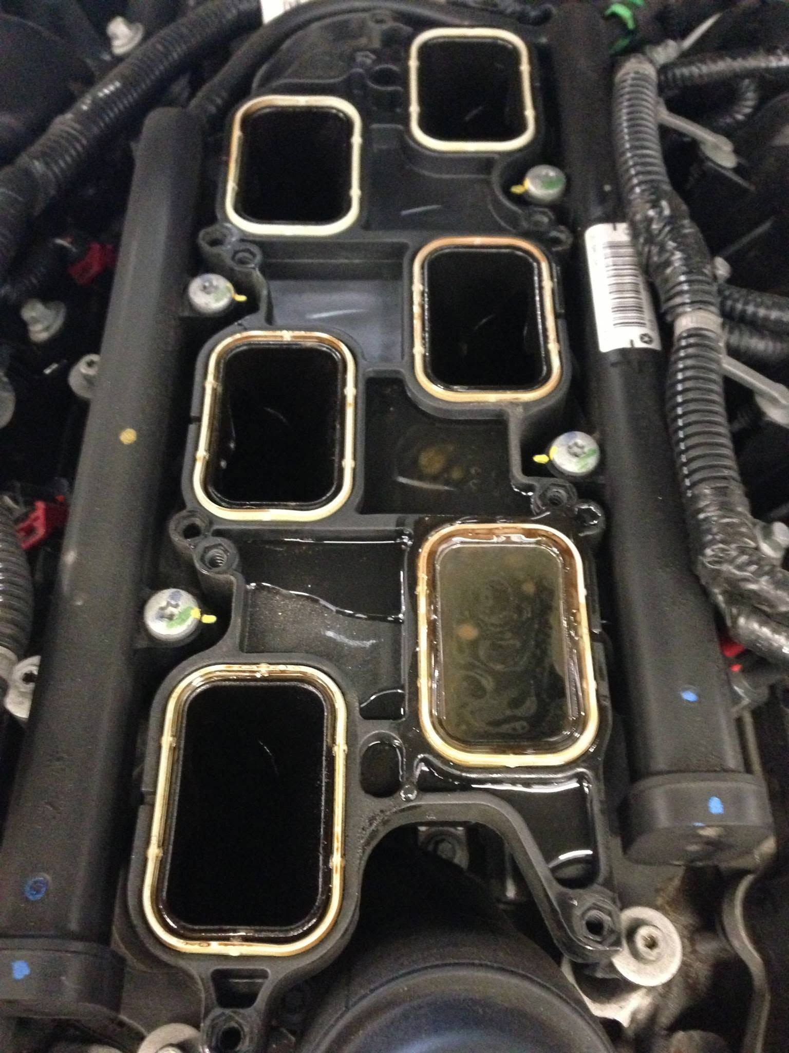 Exposed Engine Intake Ports During Auto Repair | 4th Street Auto Care Center
