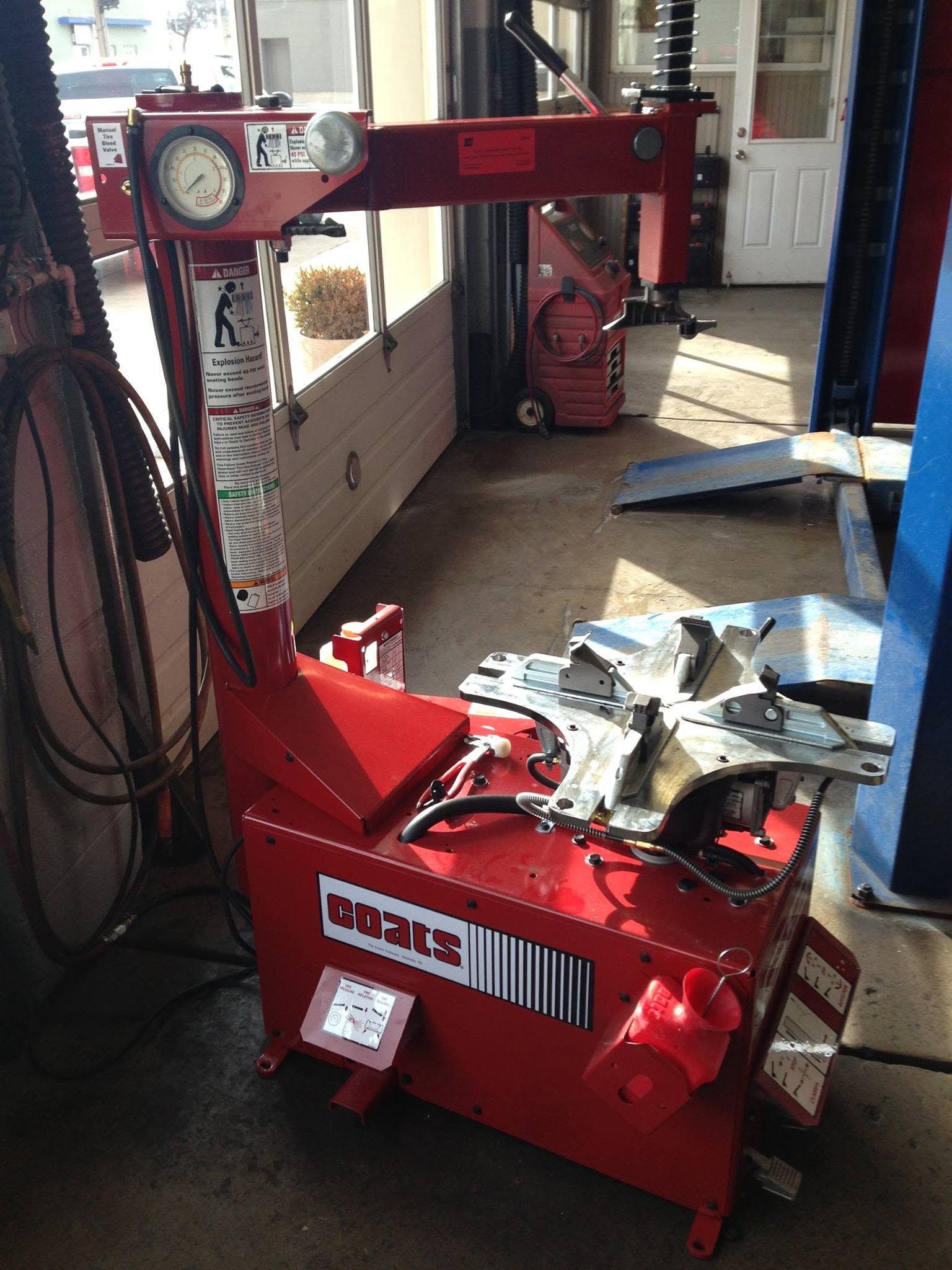Automotive A/C Service Equipment Inside Repair Shop | 4th Street Auto Care Center