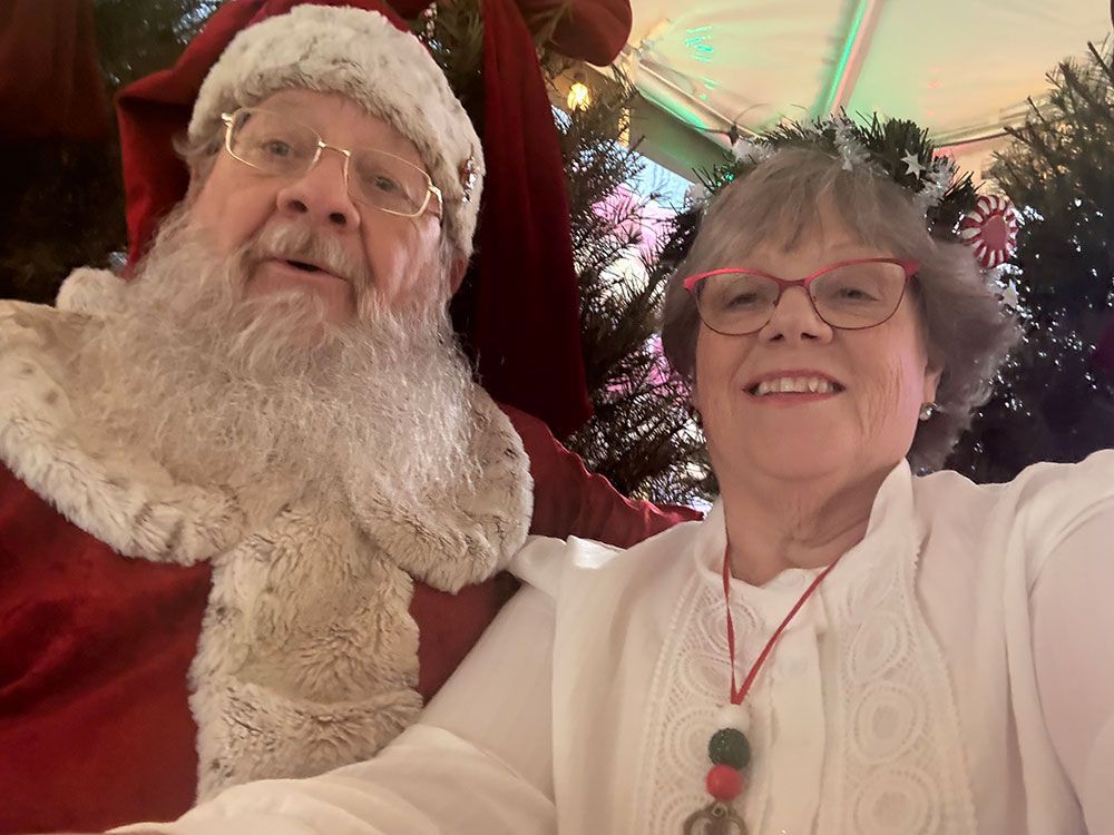 Santa and Mrs. Claus having selfie fun