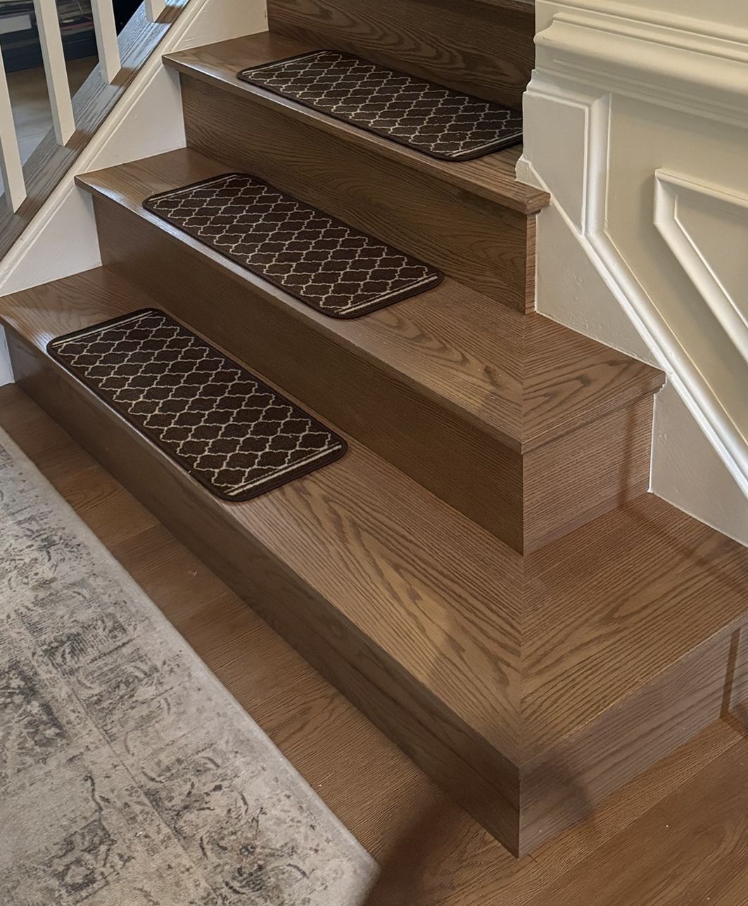 After: new stained oak treads and risers with a matching bullnose step