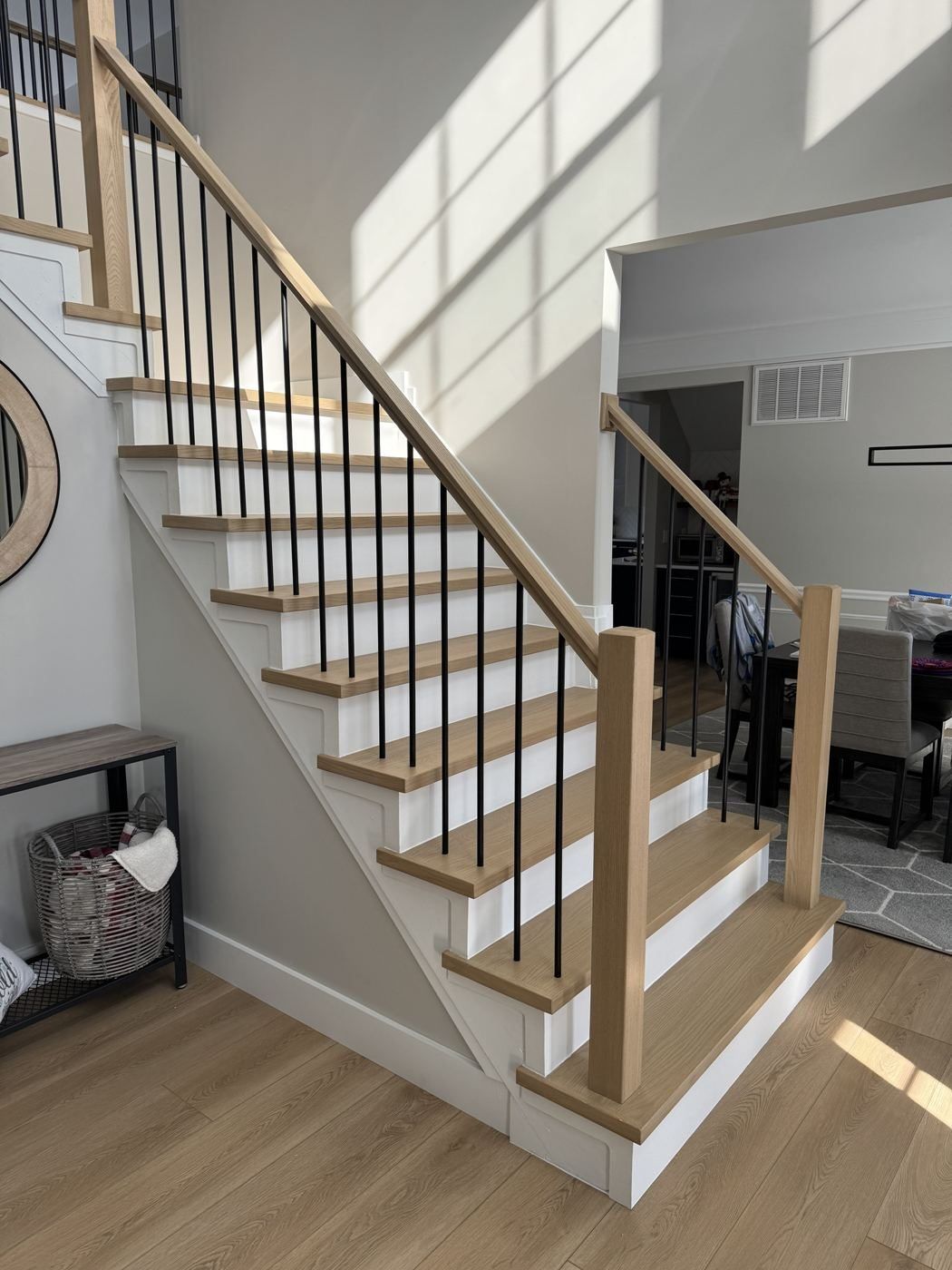 Oak treads and white risers with black balusters