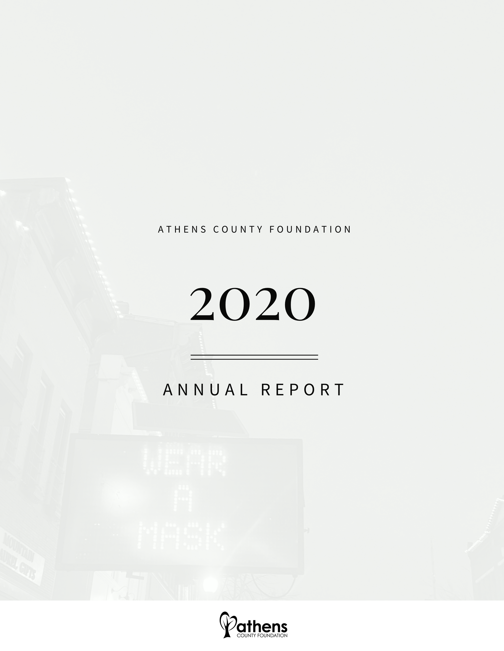 White cover of a 2020 annual report. A street scene with a 