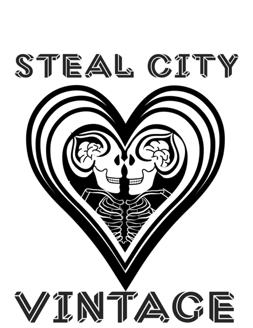 Steal City Vintage text around a black heart with two mirrored skeleton faces inside