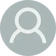 Gray user profile icon with a white outline of a person in a circle