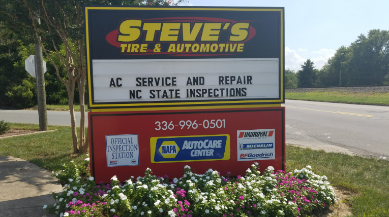 A sign for steve 's tire and automotive