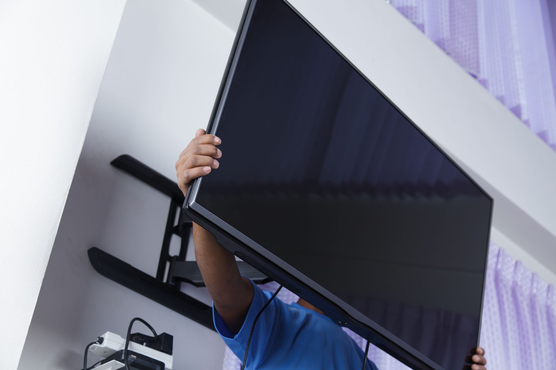 Repairing Toilet installing TV mount