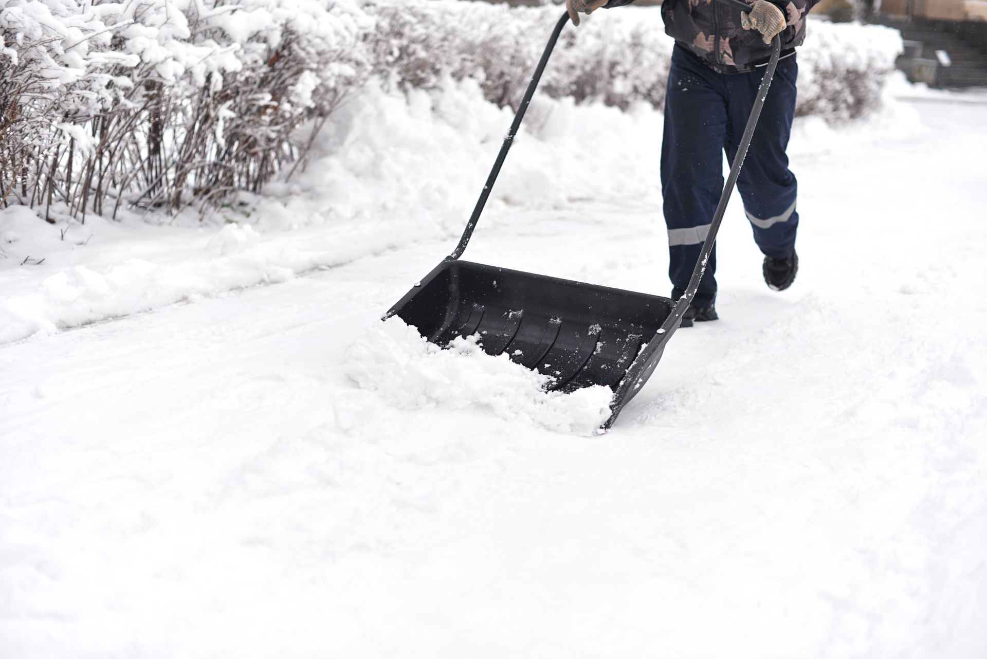 Cleaning show with big shovel