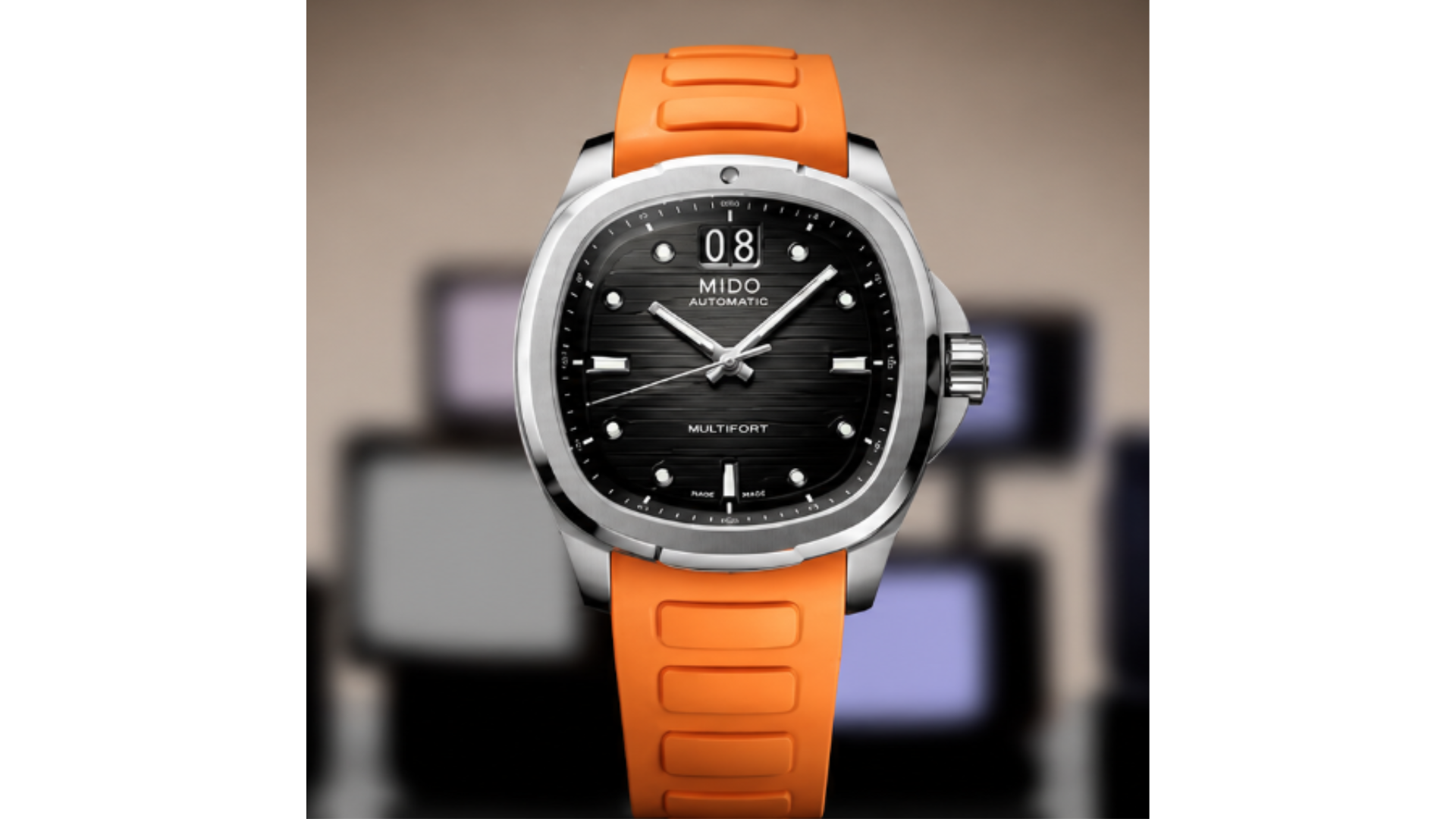 Smartwatch arancione al centro di uno sfondo sfocato di display quadrati colorati.