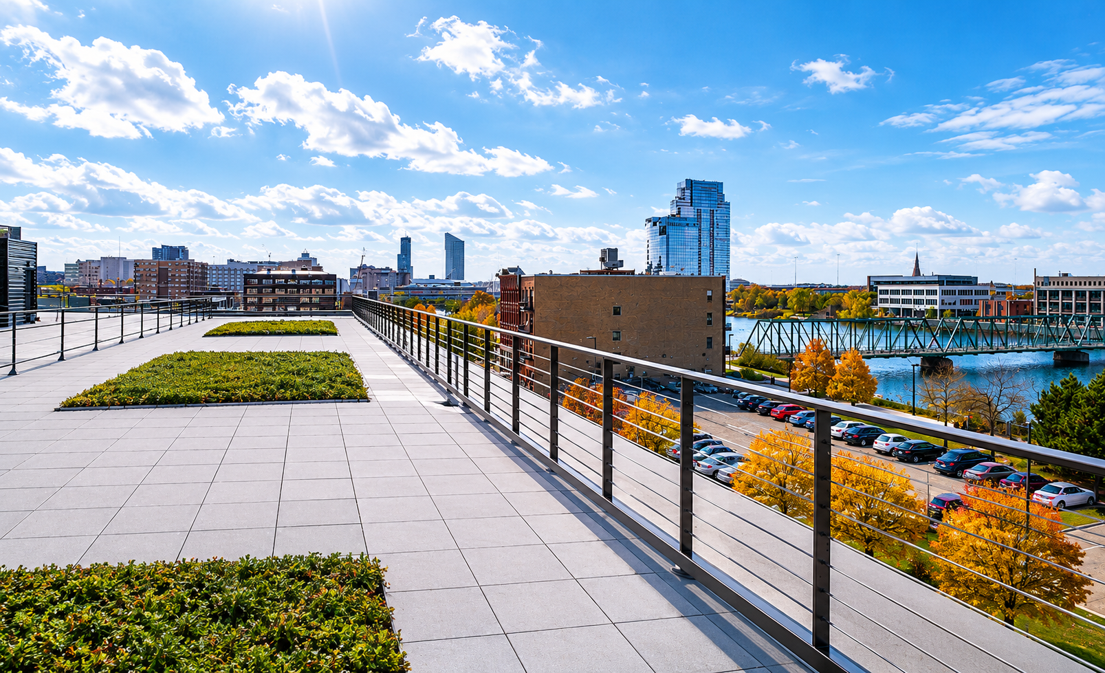 Rooftop deck view of the downtown Grand Rapids skyline from River Flats at 820 Monroe