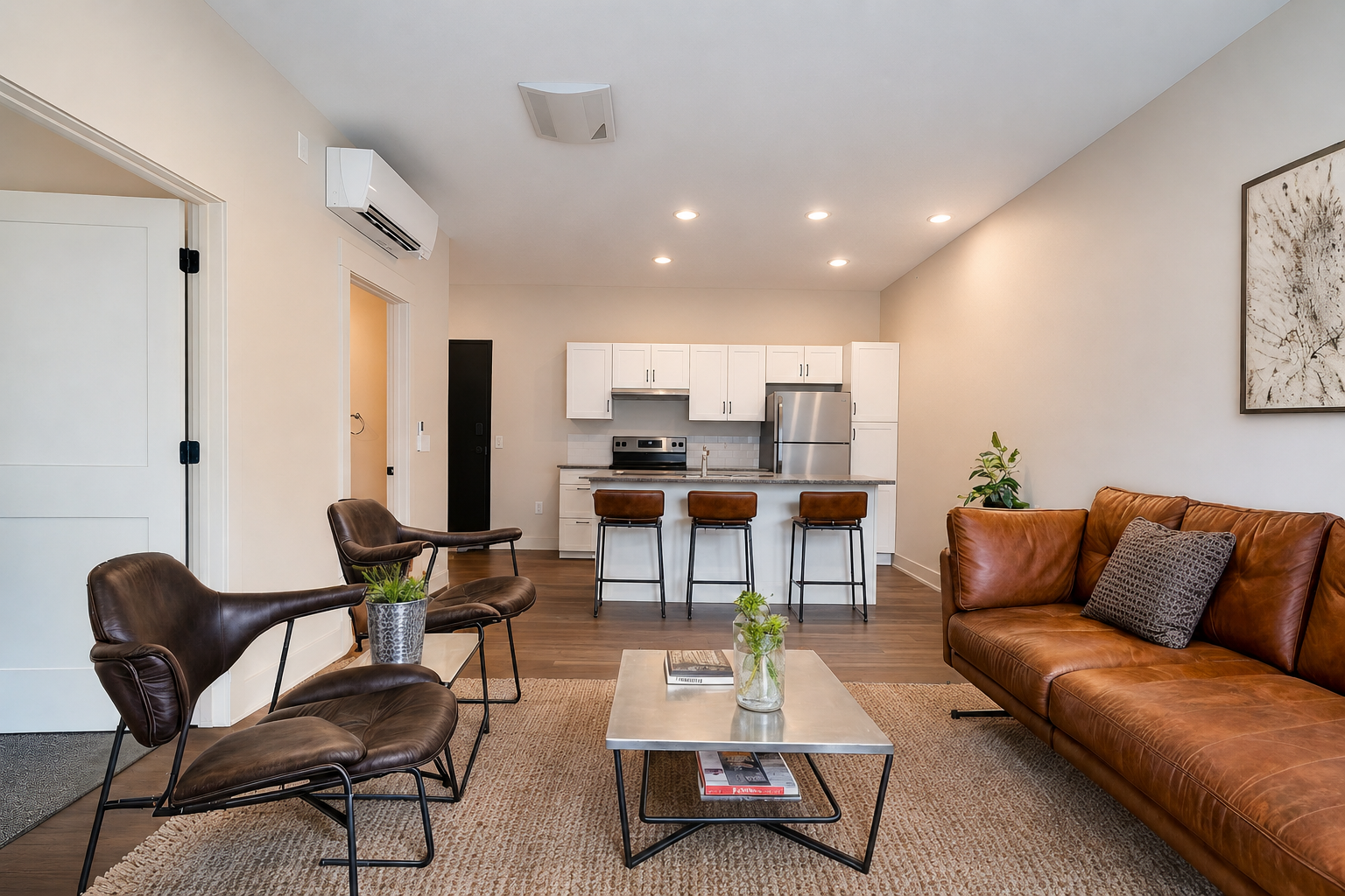 Updated kitchen and living area in a unit at Bradford Station Apartments