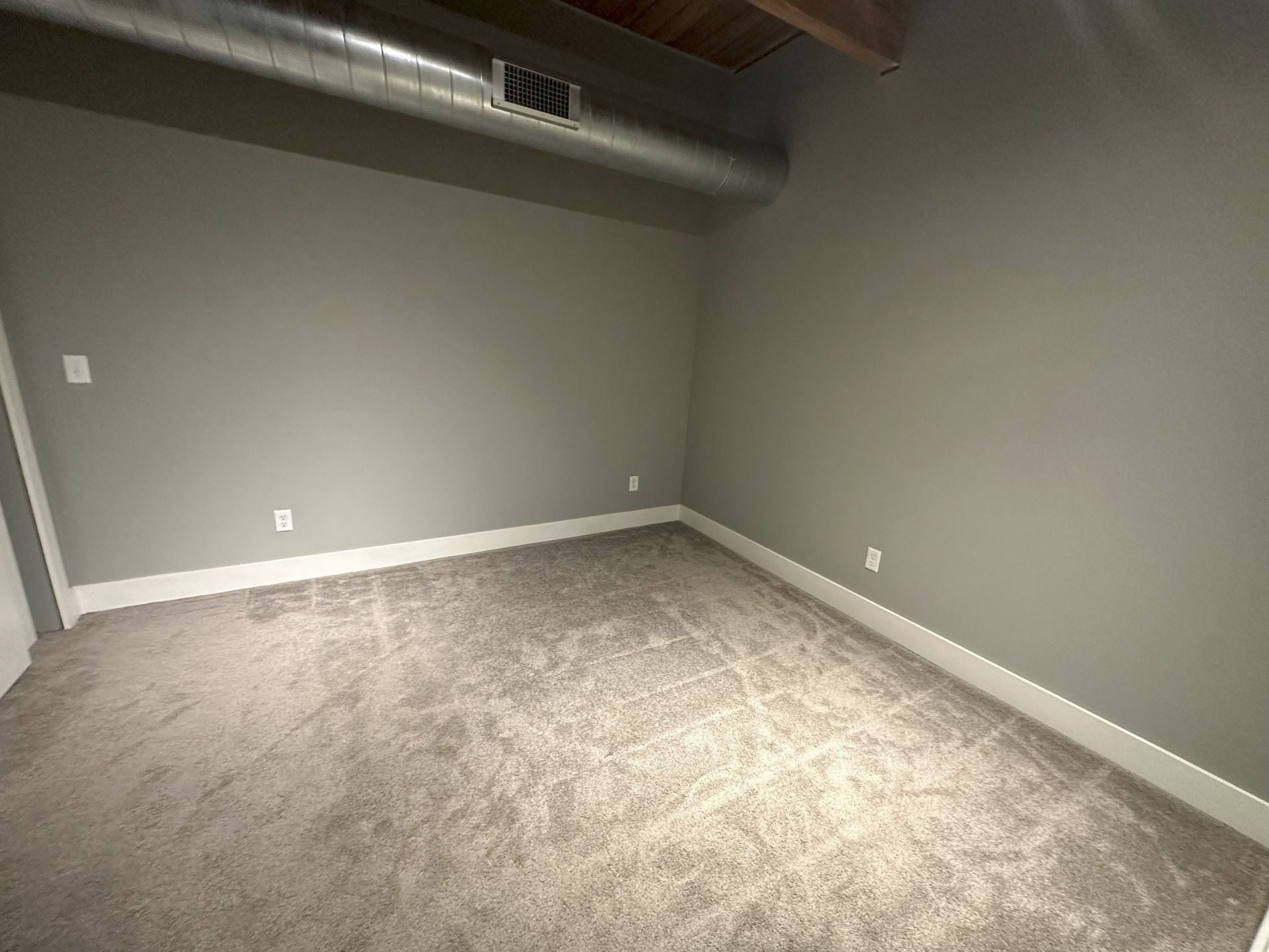 Spacious bedroom at River Flats apartments in Grand Rapids