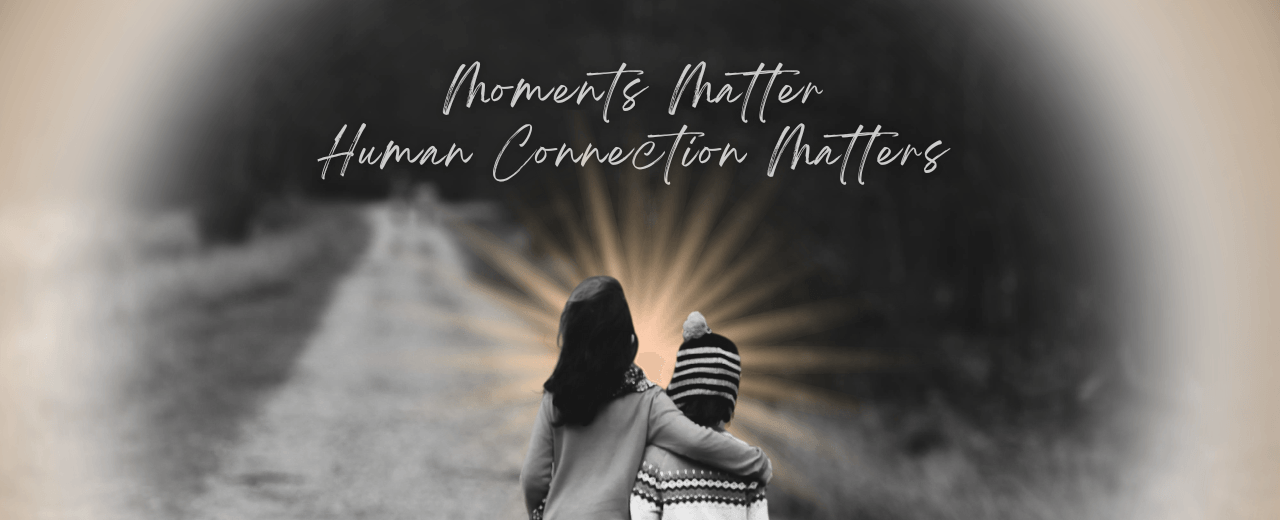 a young boy and girl walk arm in arm down a road as a black and white memory