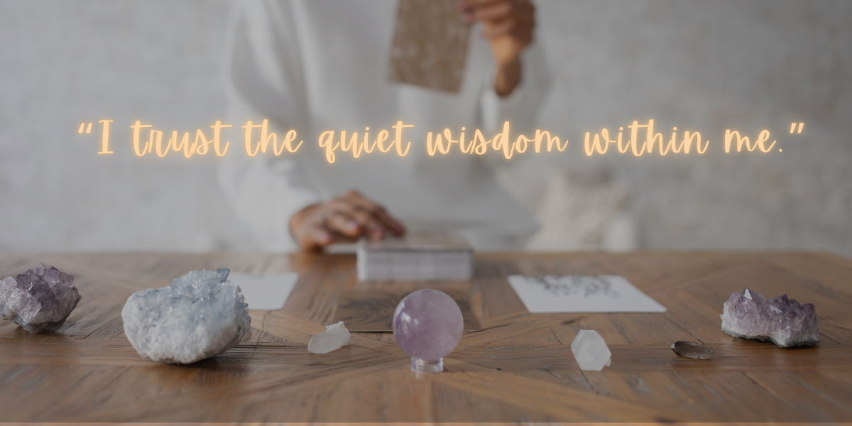 a quote affirmation about trusting yourself over an image of woman with cards and crystals