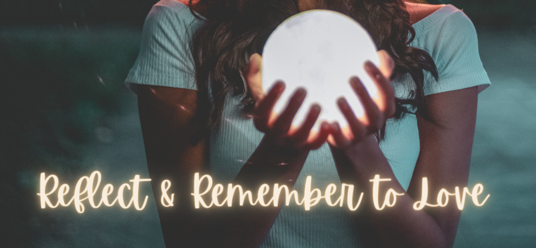 s woman holding a glowing ball that looks like the moon with a quote