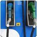 Blue and green electric vehicle charging station with two nozzles.  |  Quality Car & Truck Repair Inc