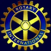 Rotary International logo: Gold gear with blue circle and text 