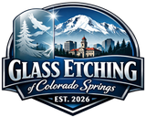 Logo for Glass Etching of Colorado Springs, featuring a mountain, cityscape, eagle, and pine tree on a blue shield.