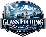 Glass Etching of Colorado Springs logo with mountains, trees, city skyline, and EST. 2026