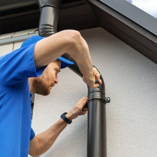 Installing Downpipes — Mornington Peninsula — CB Plumbing Group Installing Downpipes — Mornington Peninsula — CB Plumbing Group