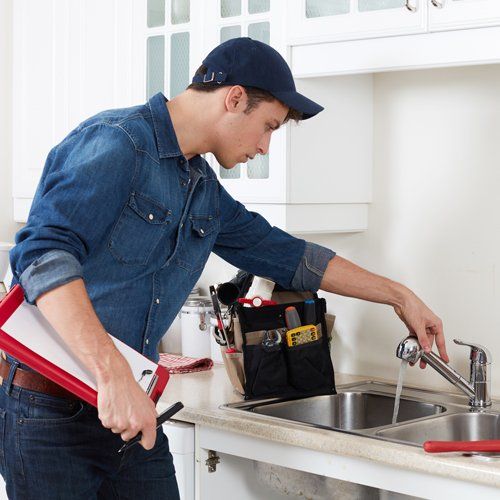 Checking Kitchen Sink — Mornington Peninsula — CB Plumbing Group Checking Kitchen Sink — Mornington Peninsula — CB Plumbing Group