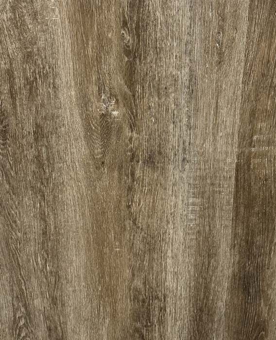 Close-up of brown-gray wood grain texture with vertical streaks