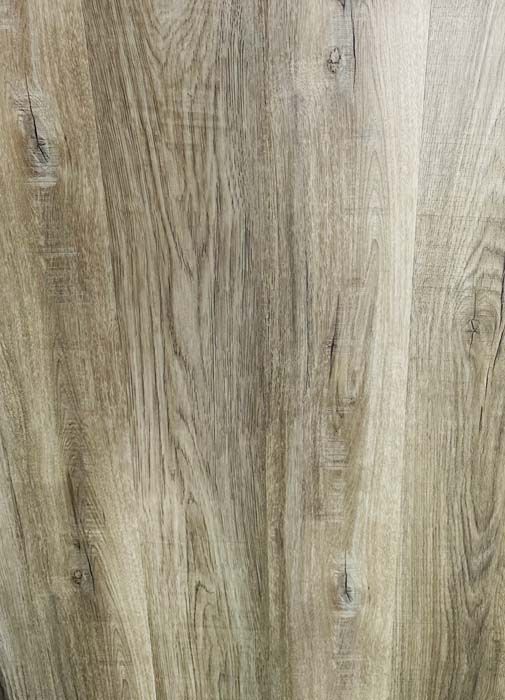 Close-up of light gray and tan wood-grain texture with vertical planks
