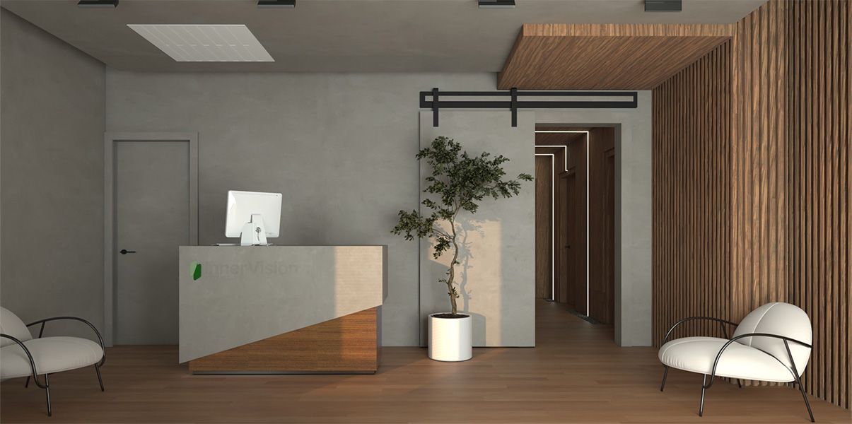 Modern minimalist lobby with reception desk, wood wall, potted plant, and lounge chairs