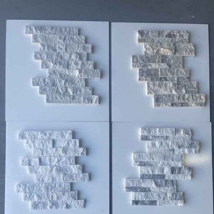 Four white textured square panels arranged in a 2x2 grid on a light background.