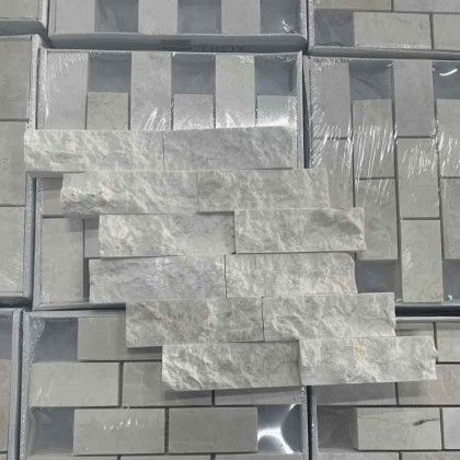 Gray textured tile samples arranged in a layered pattern on a gray background