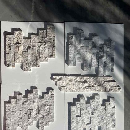 Four black-and-white textured stone tile patterns laid out on a white background.