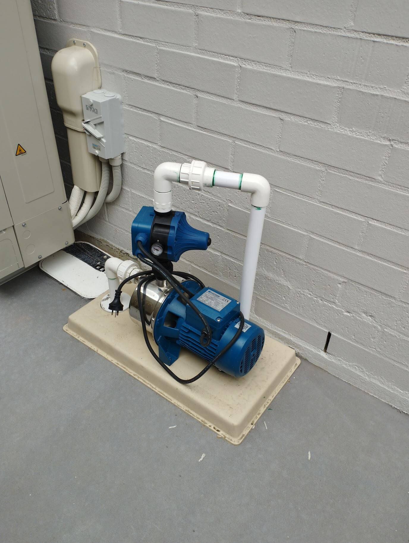 water bore drilled through concrete with a core drill. Picture of finished bore sitting on concrete. Water bore in Tauranga, Bay of Plenty