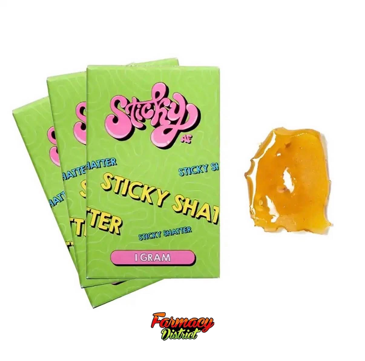 Green candy packages beside a translucent yellow gummy candy piece on a white background