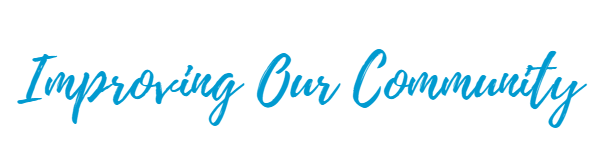 Blue script text reading “Improving Our Community” on a white background.