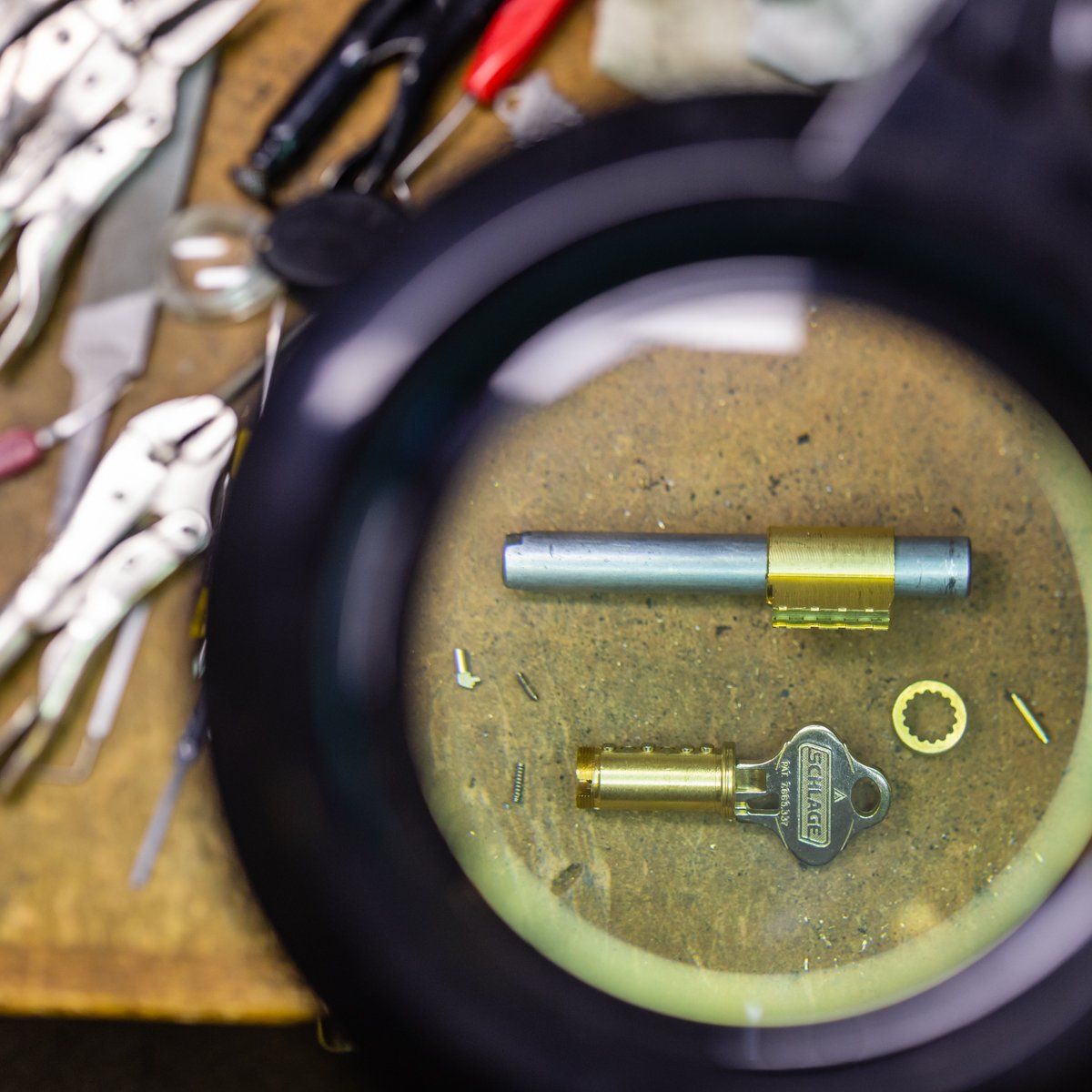 a magnifying glass shows a key