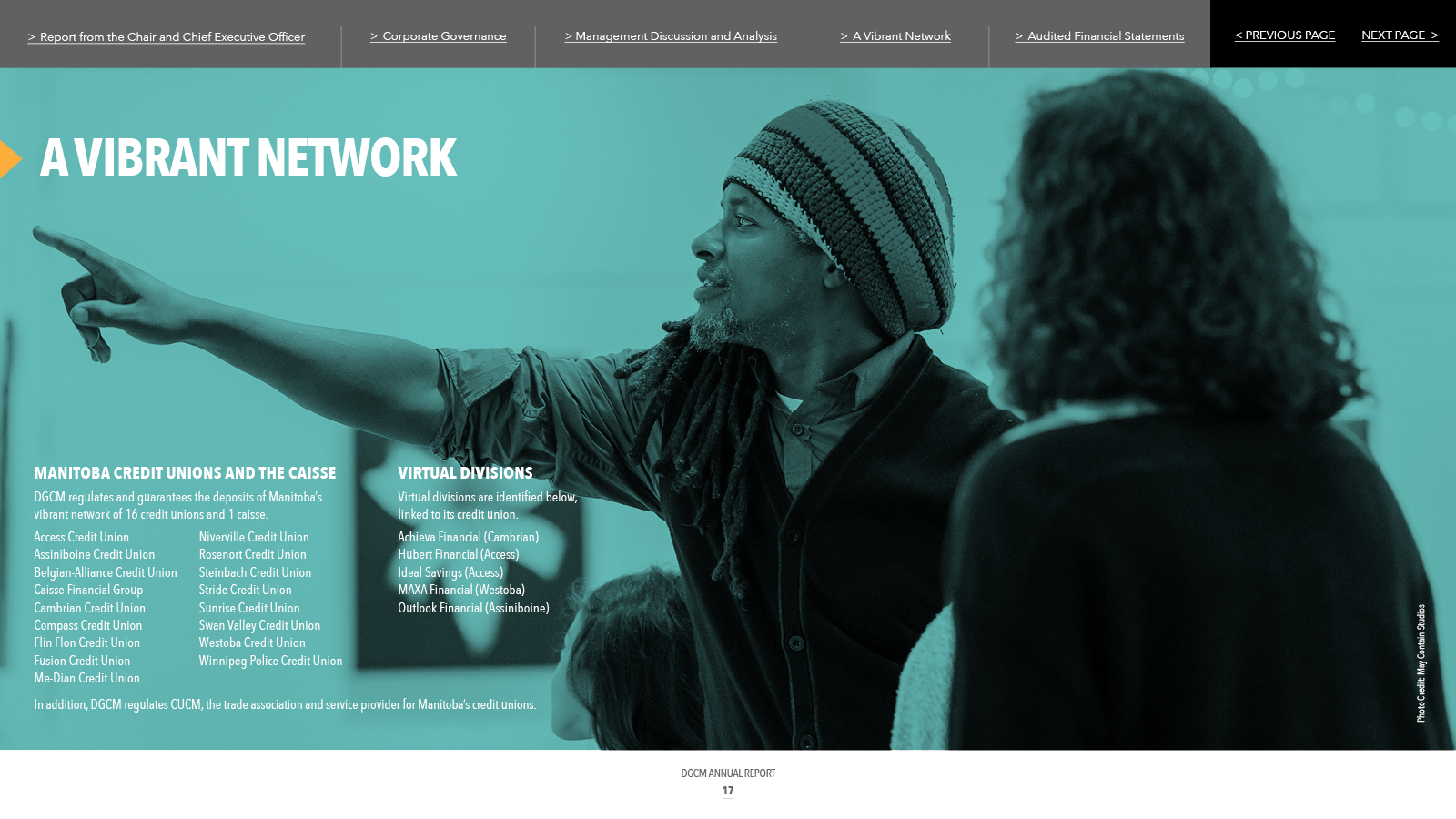 Man pointing, presenting to group. Teal backdrop.