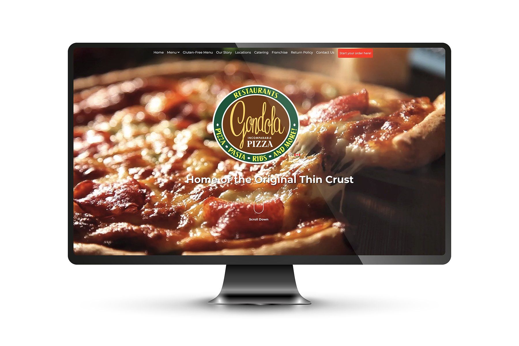 Computer screen displaying Cornish Pizza website homepage with close-up of pizza.